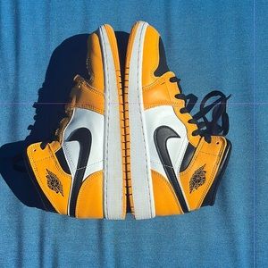 Worn yellow/orange Jordan’s, kids 5.5